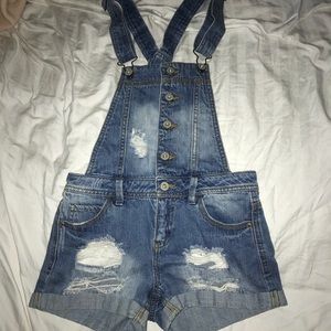 Denim distressed overalls